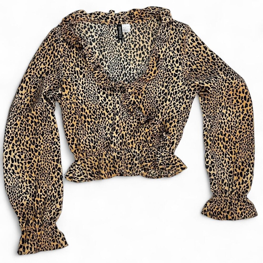 Cheetah print long sleeve blouse with ruffled sleeves and neckline #animalprint